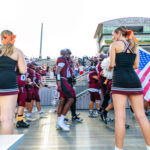 The Waller Bulldog football team takes to the field en route to defeating Conroe Caney Creek, 41-7, for the Bulldog’s first victory at home since 2021, at Daikin Stadium, Aug. 31, 2024. (Photo by Creighton Holub, courtesy RoninVisuals.com)